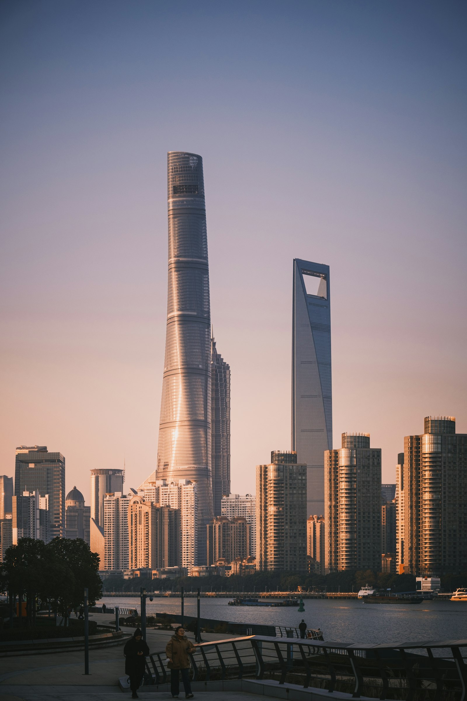 The Shanghai Tower and the World Financial Center in Lujiazui, seen across the river at sunset